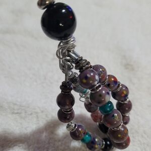 Elegant Beaded Bracelet with Purple and Black Accents
